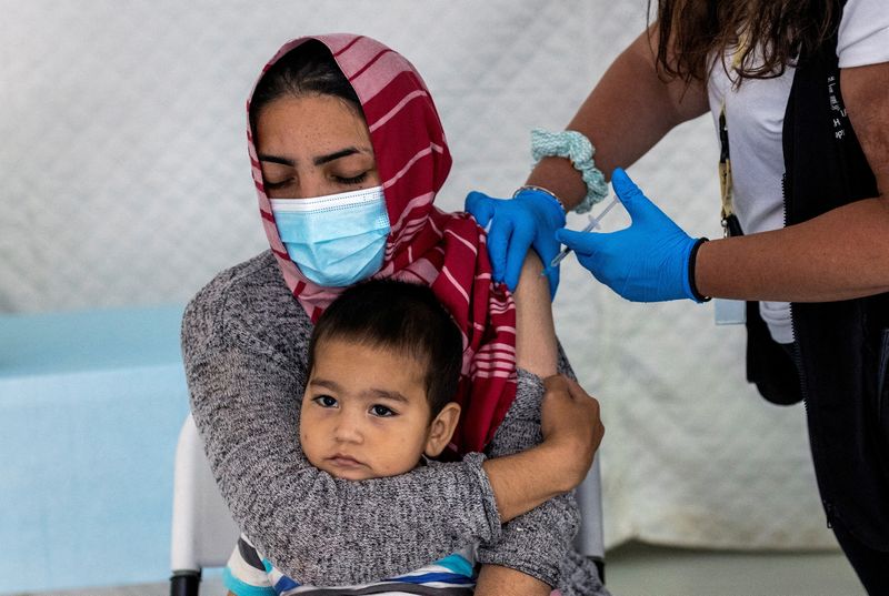 Refugees lack COVID shots because drugmakers fear lawsuits - documents