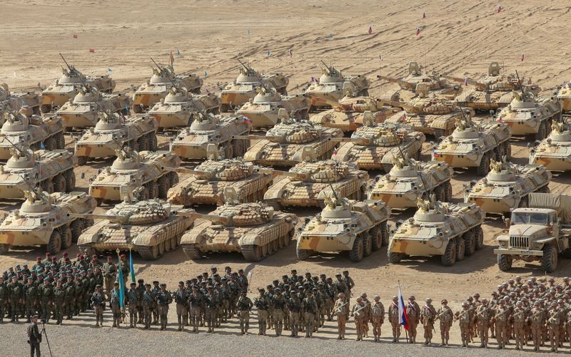 Russia sends new tanks to base in Tajikistan, practices missile defence