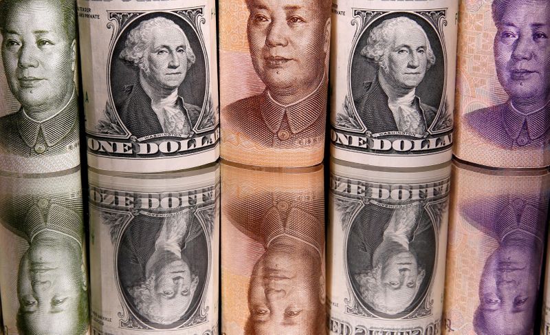 Short bets on Asian FX rise as Omicron uncertainty grips markets: Reuters poll