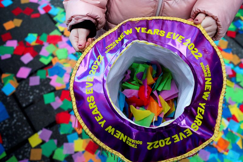 Some cautious, many fed up, Americans prepare to ring in the New Year