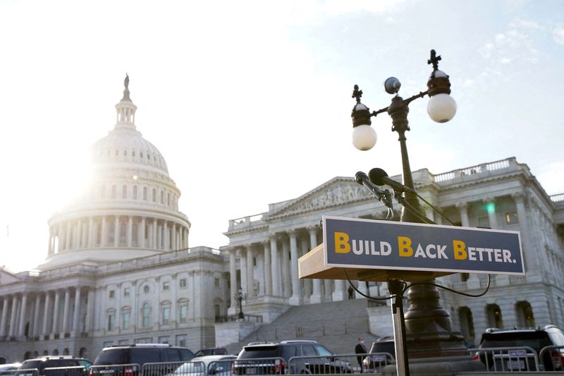 With Biden spending plan blocked, economists cut 2022 growth forecasts