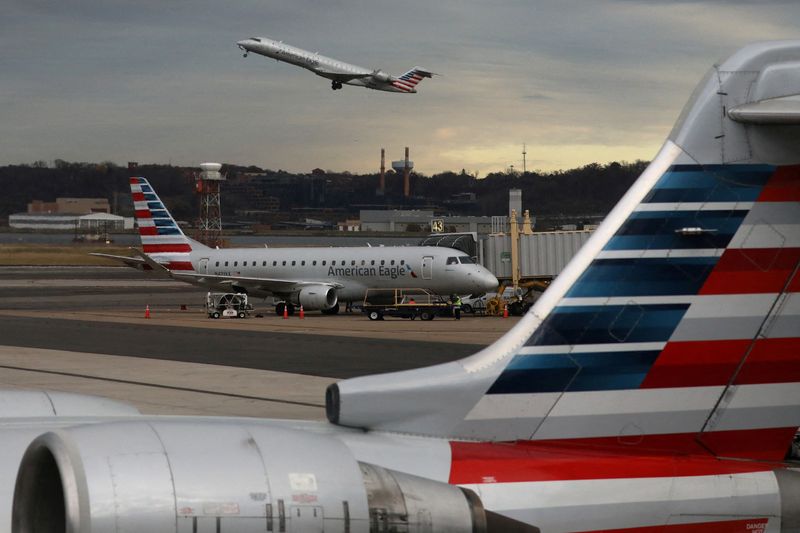 American Airlines loss narrows on strong holiday travel demand