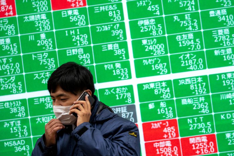 Asian shares break losing streak as China cuts key mortgage rate