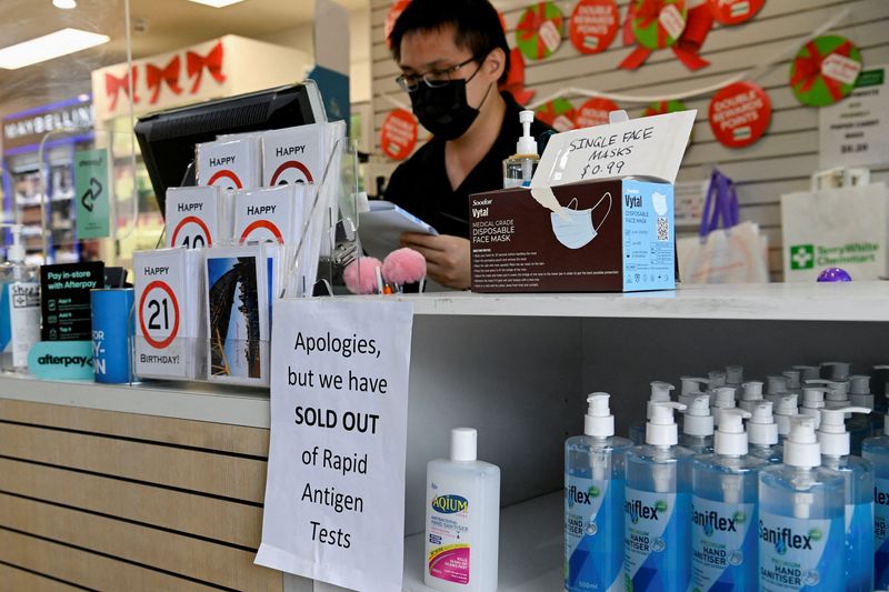 Australia suffers record COVID cases, straining businesses and supply chains