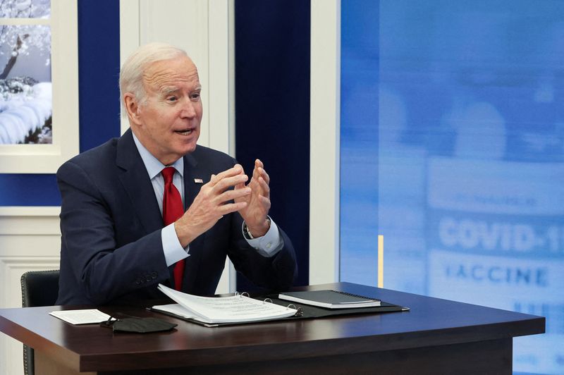 Biden urges vaccines, says not even the White House is immune to COVID-19