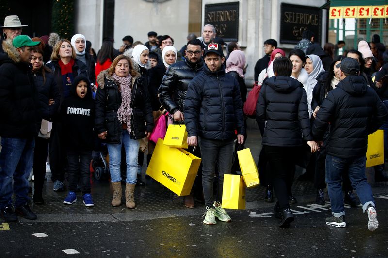 Champagne and treats: Britons fight the Christmas COVID blues