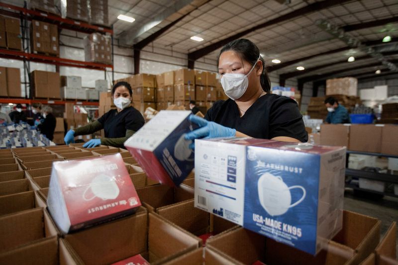 Burned by COVID supply crunch, hospitals invest in U.S. mask-making