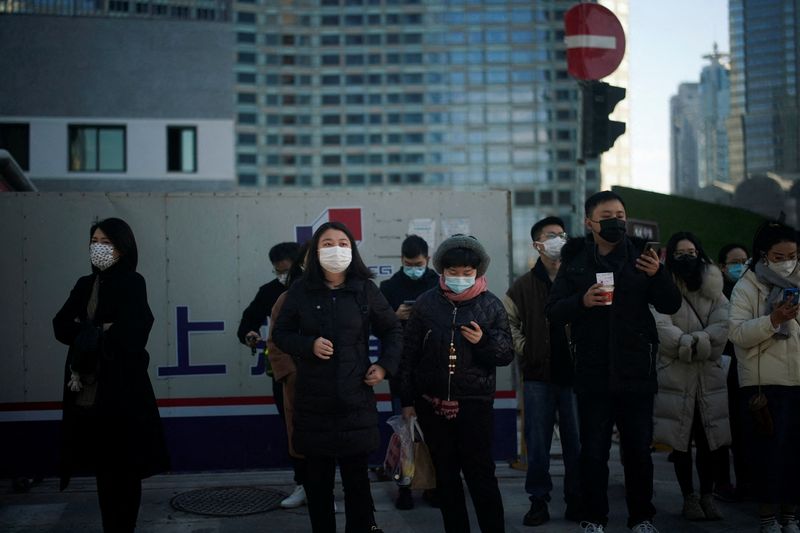 China suspends more flights over COVID-19, Shanghai curbs tours