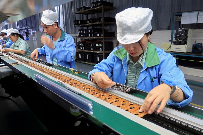 China's Dec factory activity returns to growth, beats forecasts- Caixin PMI