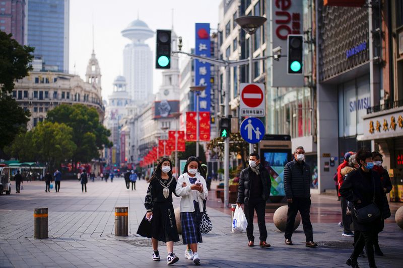 Chinese cities tighten COVID-19 curbs as Tianjin battles Omicron outbreak