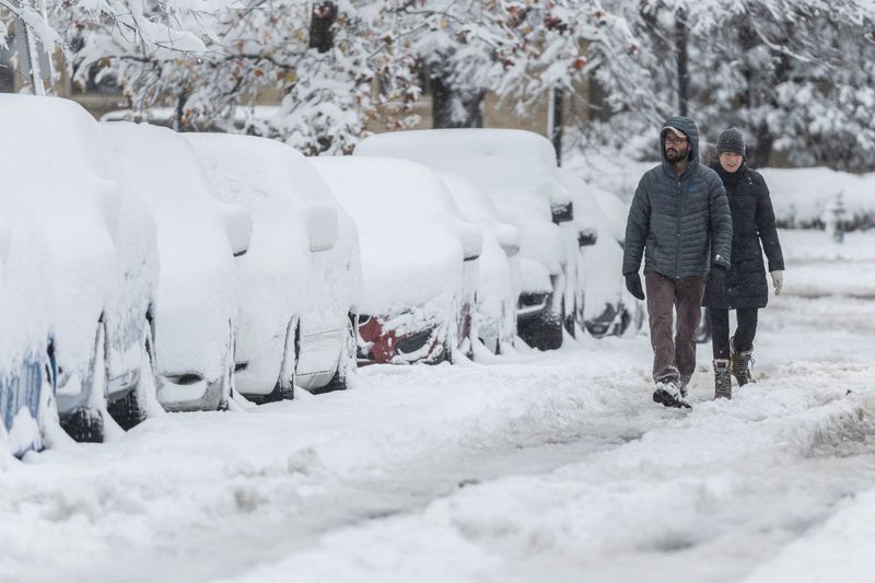 Drivers trapped in cars after U.S. snowstorm shuts major road in Virginia