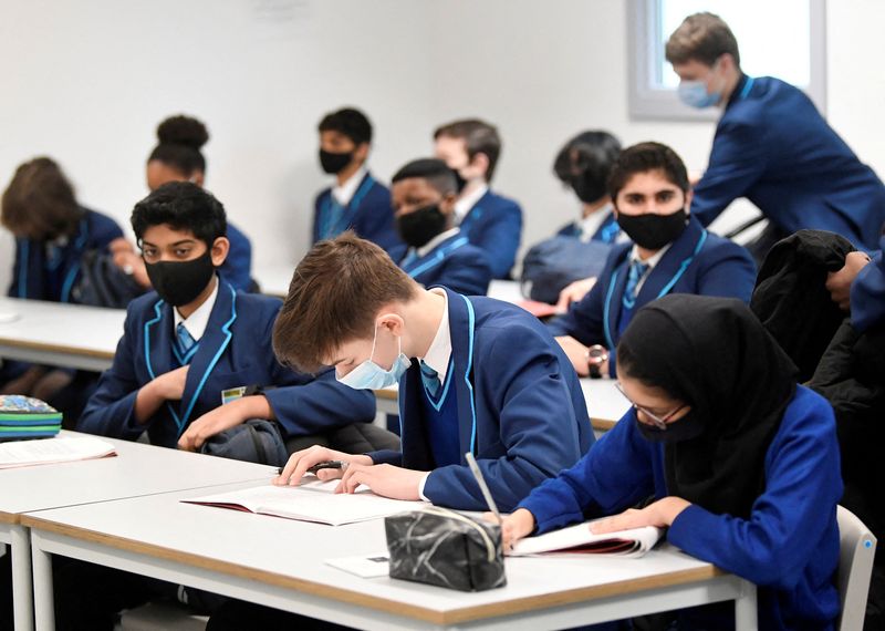 English school children to wear masks to tackle Omicron surge