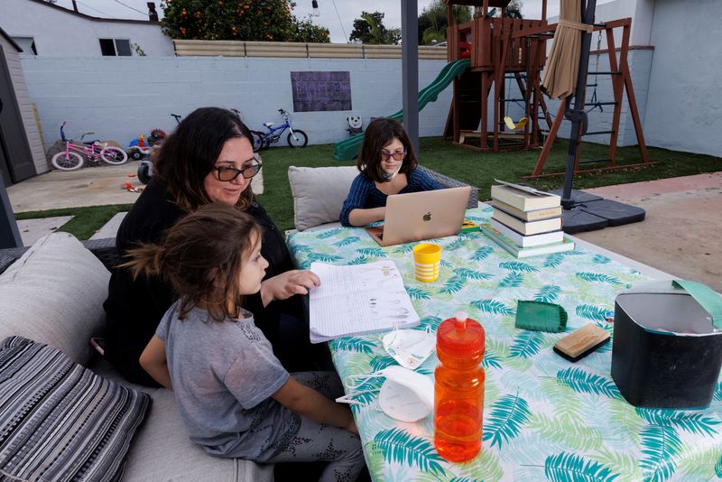 Exhausted parents navigate a patchwork of U.S. school COVID-19 policies