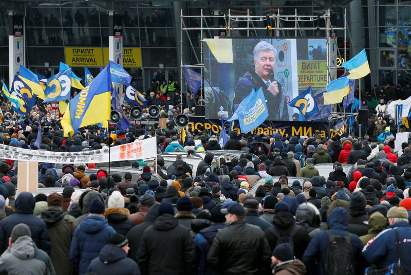 Former Ukrainian president lands in Kyiv to face treason case