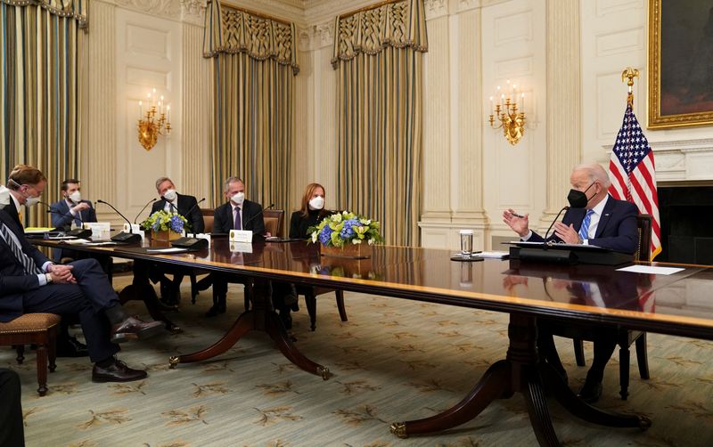 GM, Microsoft tout Biden climate, social spending push