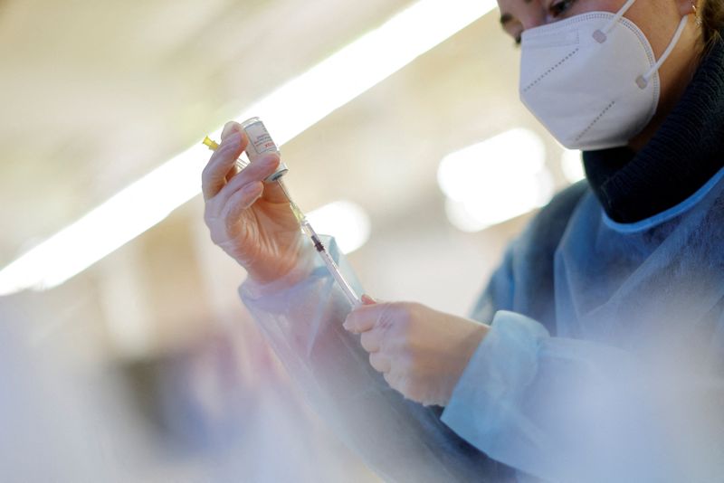 German COVID cases hit record as parliament debates vaccine mandate