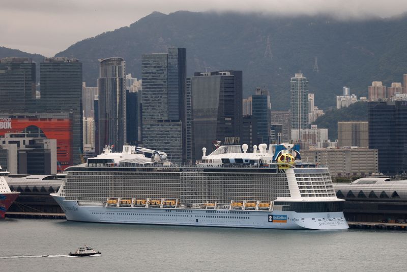 Hong Kong hunts COVID patient's contacts, orders cruise ship back to port