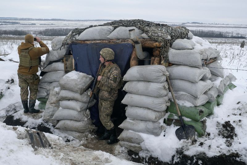 In snowy trenches, Ukrainian soldiers vow to stand firm against Russia