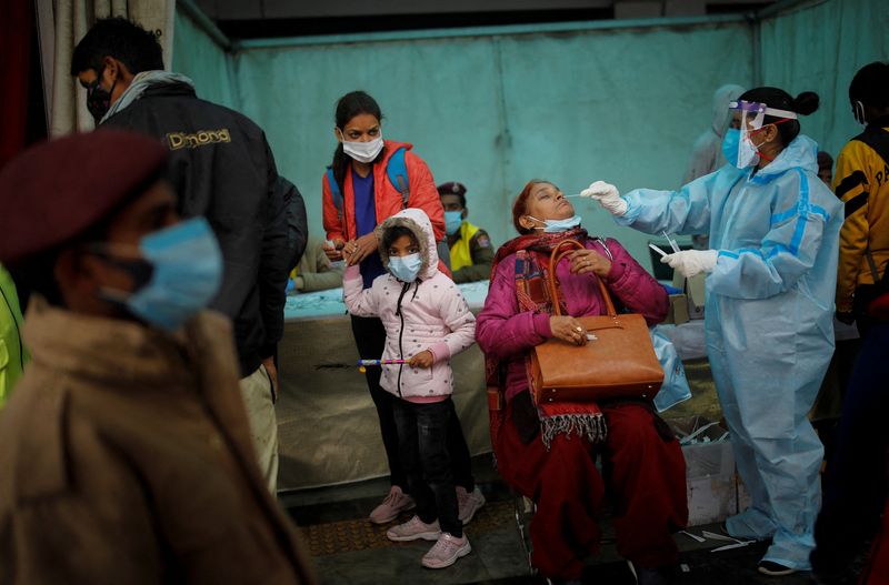 India confirms first Omicron-related death as COVID-19 cases jump