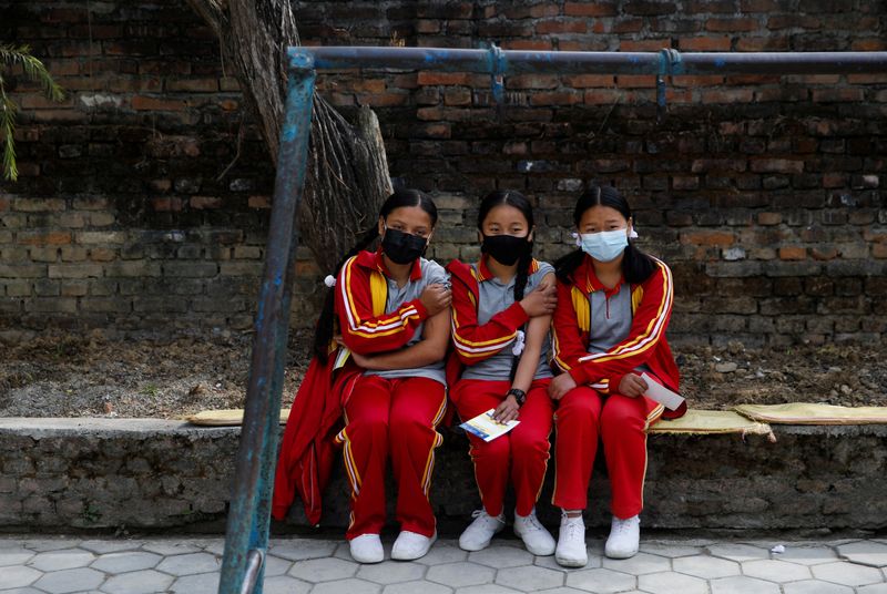Nepal bans big public gatherings, closes schools as COVID cases spike