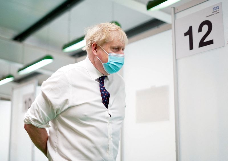 Omicron 'plainly milder'; new measures not needed, UK's Johnson says