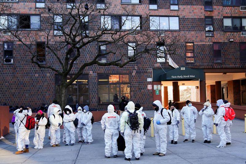 Open door may have contributed to death toll in New York fire, mayor says