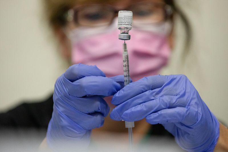 Pfizer study shows COVID-19 booster can be given along with pneumonia shot