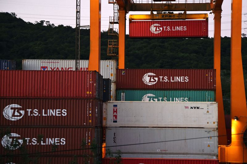Taiwan December export orders hit record high, warns on supply chains