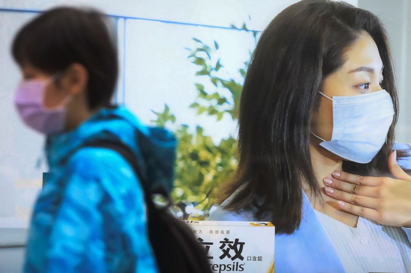 Taiwan urges vigilance after first Omicron coronavirus cases