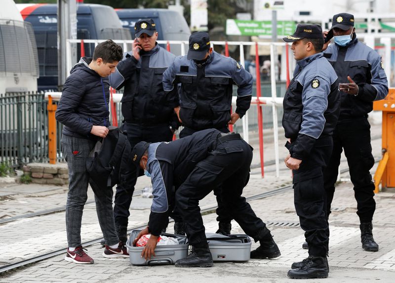 Tunisia police turn water cannon on protest against president