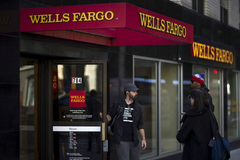 Wells Fargo profit rises on asset sales boost