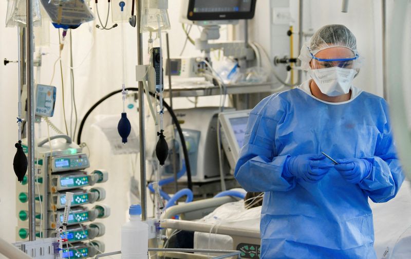 With peak yet to come, Europe's healthcare creaks under Omicron's rapid spread