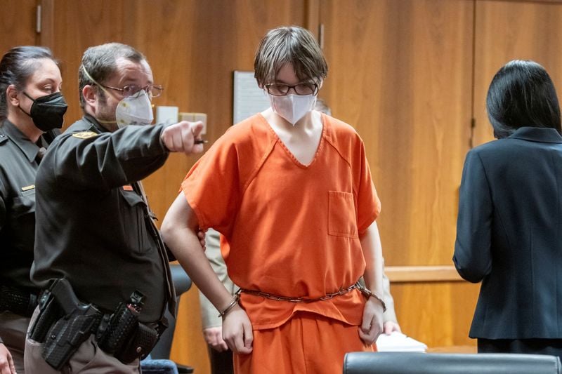 Michigan judge weighs charges for parents who bought high-school shooter gun