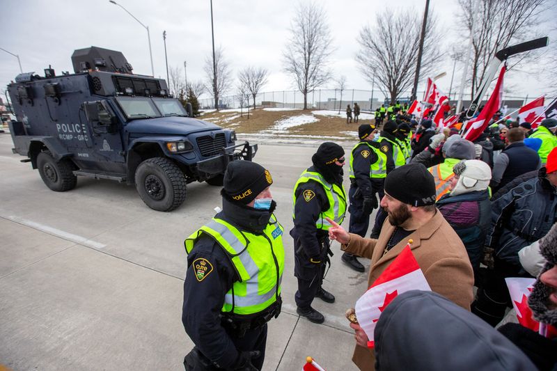 Canada protesters, police deadlocked as tensions simmer at blocked border bridge