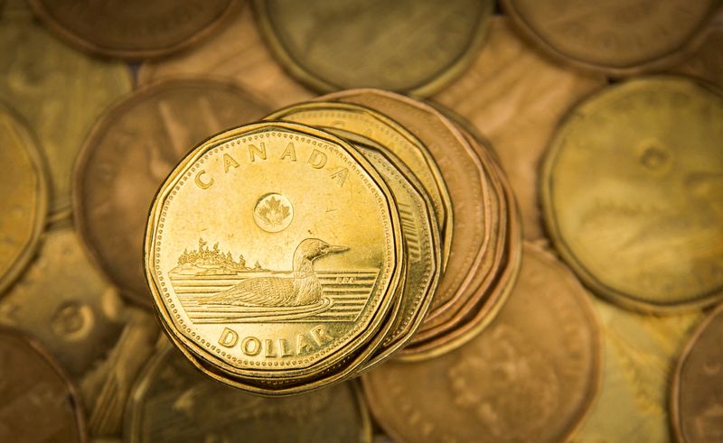 Canadian dollar firms as oil surges on Ukraine war fears