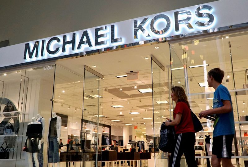 Capri raises revenue forecast on firm demand for luxury handbags, apparel