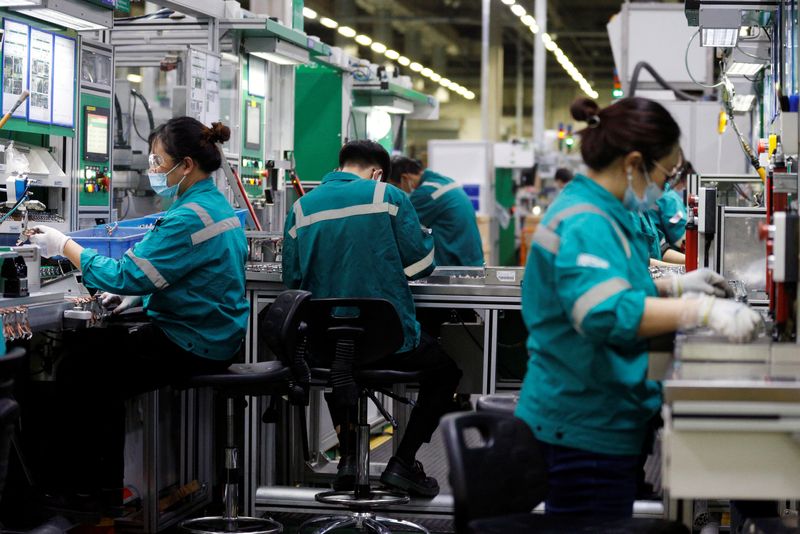 China's February factory activity likely shrank amid holidays, Olympics