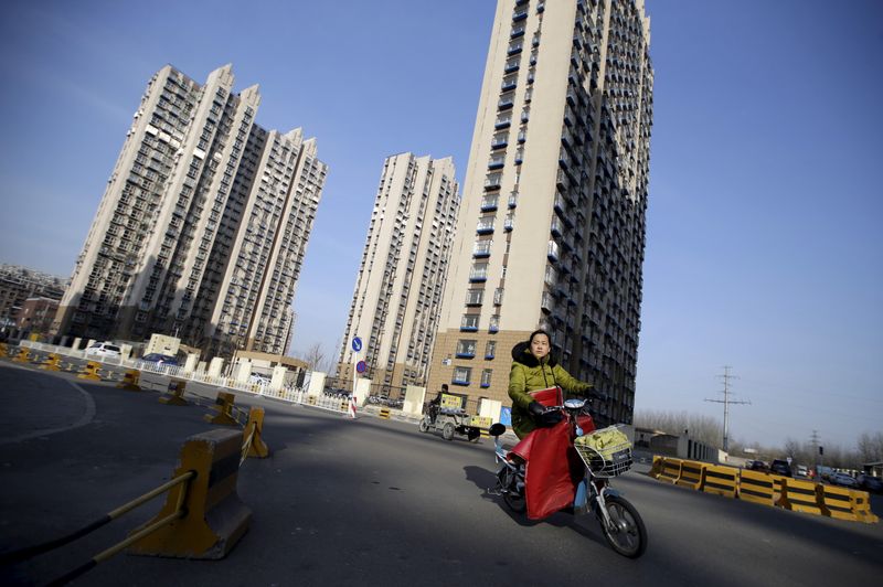 China's Jan new home prices rise for first time m/m since Sept