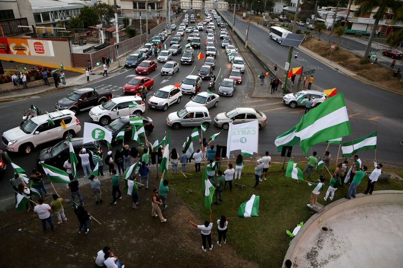 Costa Ricans head to polls, largely undecided, as runoff expected