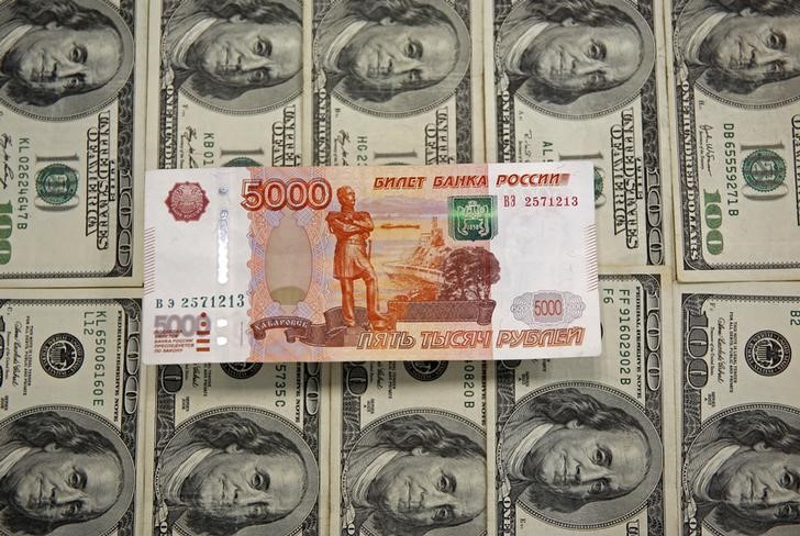 Dollar Up, Gains as Russian Rouble Falls to All-Time Low Amid Fresh Sanctions