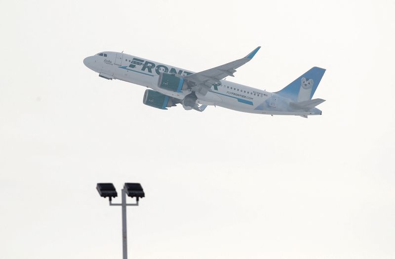 Frontier Airlines temporarily halts all flights after tech issue