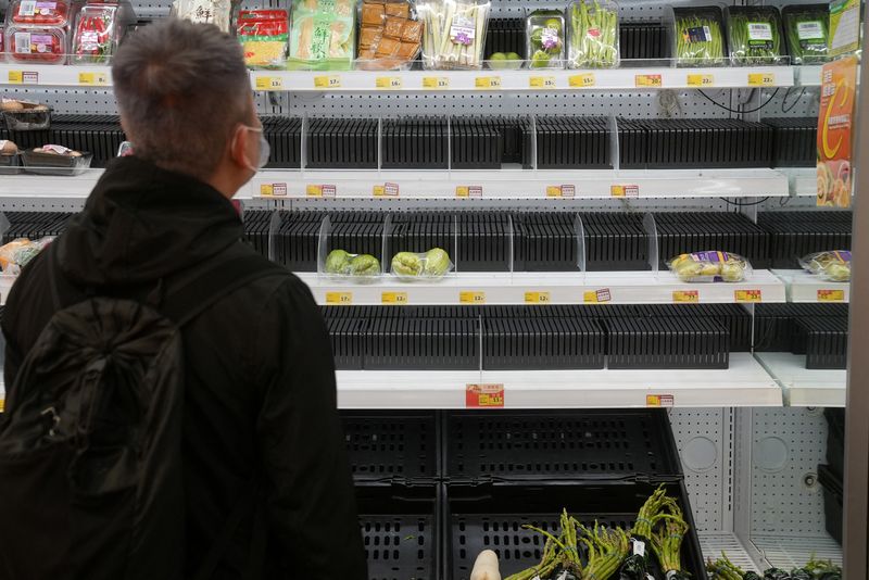 Hong Kong food supplies may be disrupted as COVID hits goods drivers