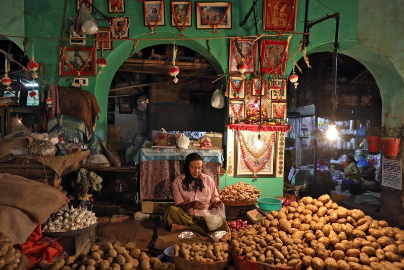 India's Jan WPI inflation eases marginally to 12.96% y/y