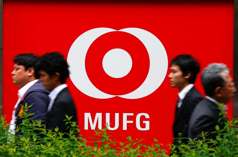 Japan's three megabanks post mixed results, cautious over outlooks amid COVID uncertainties