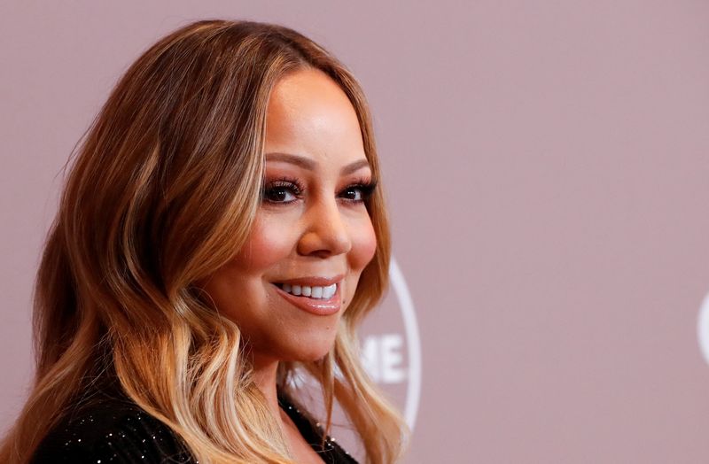 Judge tosses most of lawsuit by Mariah Carey's brother over singer's memoir
