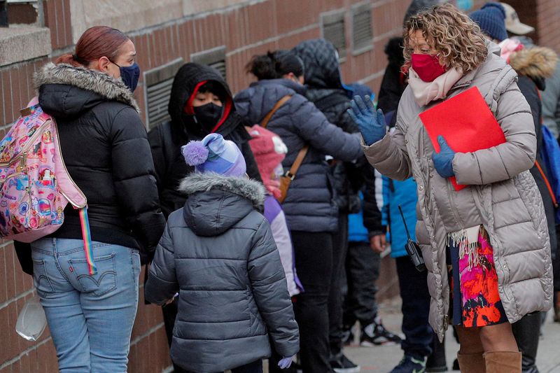 New York eases COVID-19 rules, Massachusetts to drop school mask mandate