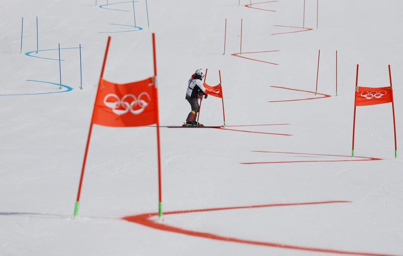 Olympics-Organisers scramble as weather disrupts penultimate day