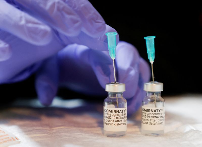 Pfizer COVID vaccine, pill forecasts miss estimates; shares fall 4%