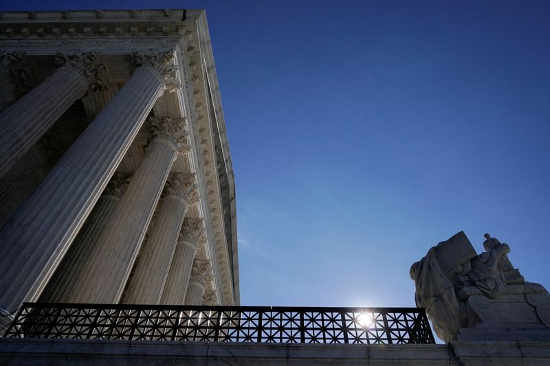Rights groups urge Biden to repudiate racist U.S. Supreme Court rulings