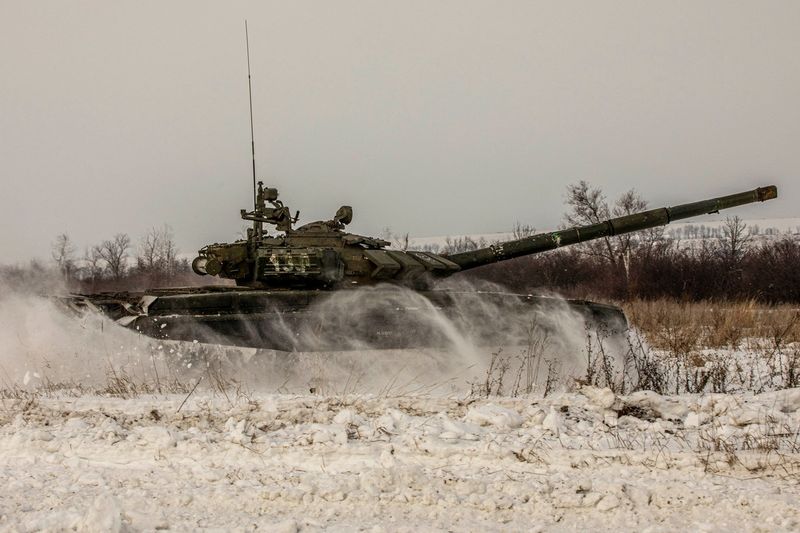 Russia returns some troops to base in areas near Ukraine - report